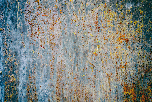 abstract photograph of textured rusty metal wall